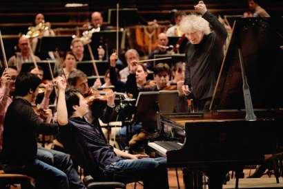 This charming man: Lang Lang rehearsing with Sir Simon Rattle and the Berlin Philharmonic