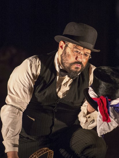 Clean-voiced and suave: Mark Wilde as the balladeer Jonny Inkslinger in‘Paul Bunyan’