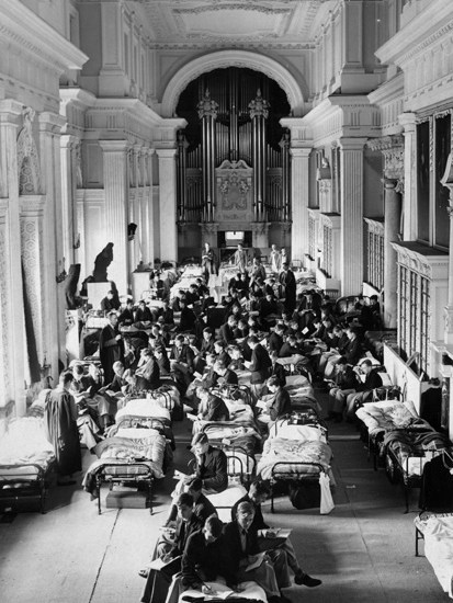 The Long Library at Blenheim Palace, converted into a dormitory for the boys of Malvern school in 1940