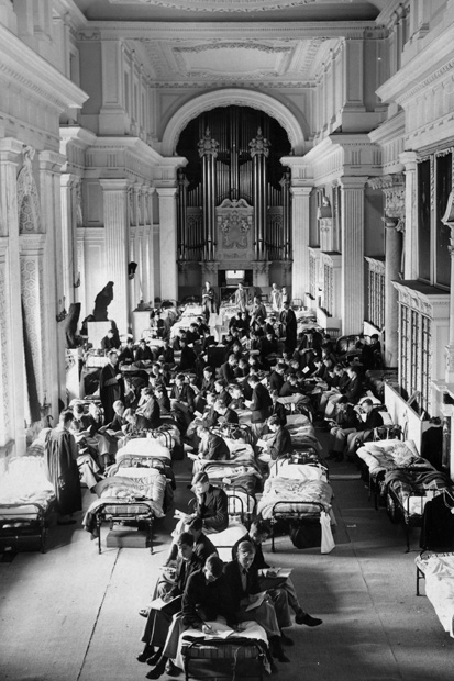 The Long Library at Blenheim Palace, converted into a dormitory for the boys of Malvern school in 1940