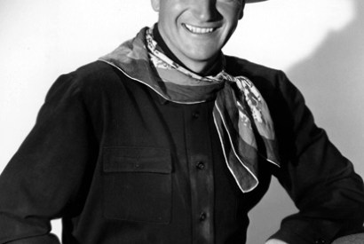 A boy named Marion: John Wayne pictured on the set of Stagecoach (1939)