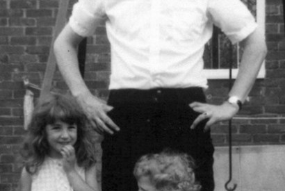 Comforting domesticity: Alan Johnson with his stepdaughter Natalie and daughter Emma