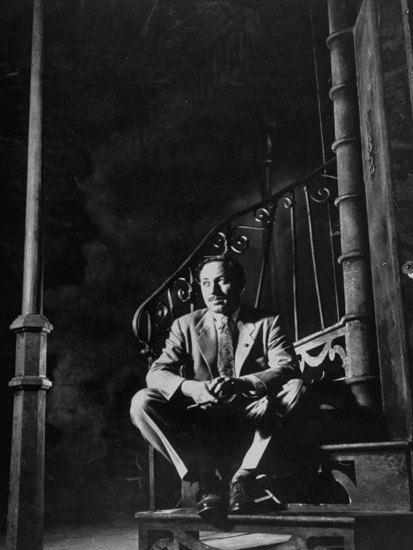 Tennessee Williams on the stage set of A Streetcar Named Desire (1947)