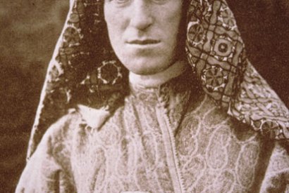 The young T.E. Lawrence in Arab dress
