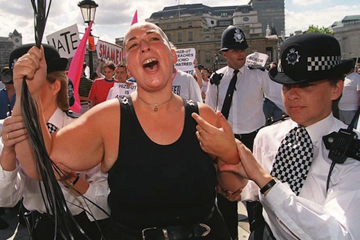 A homosexual rights activist is led away by police