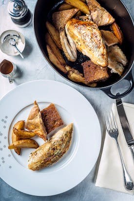 The Grill at The Dorchester - Black leg free-range chicken, 'street corner' potatoes, toasted country bread high res