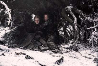 Sophie Turner as Sansa Stark and Alfie Allen as Theon Greyjoy in ‘Games of Thrones’