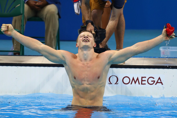 Adam Peaty celebrates winning gold and setting a new world record in the Men's 100m Breaststroke (Photo: Getty)