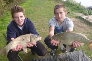 Proud boys with their Fishing4Schools catch.