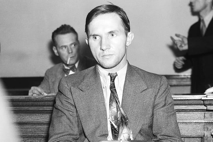 A frightened Bruno Hauptmann — dubbed ‘The Most Hated Man in the World’— awaits questioning by the FBI over the kidnapping of the Lindbergh baby