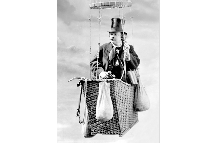 Nadar ascending aloft in his basket — in this case in his studio, recording the event for mass consumption