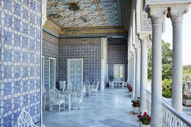 A blue-and-white loggia overlooks the entrance to the Residence in Tunis