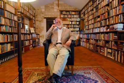 Portrait of the reader as devoted book-owner: Alberto Manguel in happier days, at home in his library in France