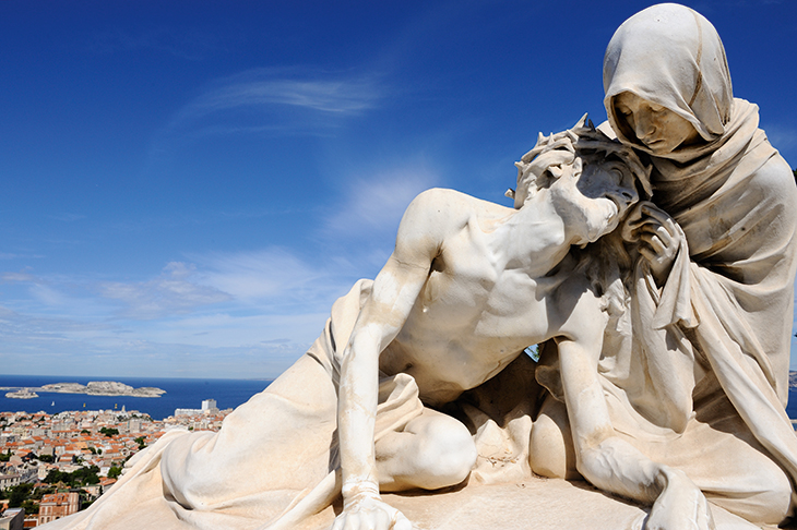 View of Marseille from the basilica of Notre-Dame de la Garde, also known as La Bonne Mère, traditionally regarded as the city’s protectress. ‘The Good Mother intervenes at sick beds, down shadowy streets, and in the dark hours of night,’ writes Iain Sinclair [image: Getty]