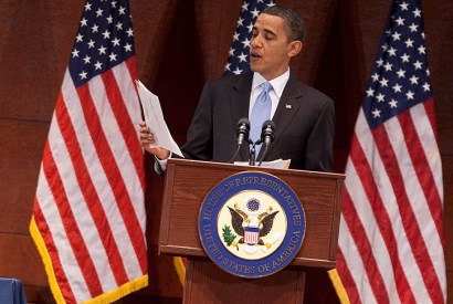 Obama reads a letter from a citizen pleading for Health Care Reform in March 2010. Credit: Getty Images.