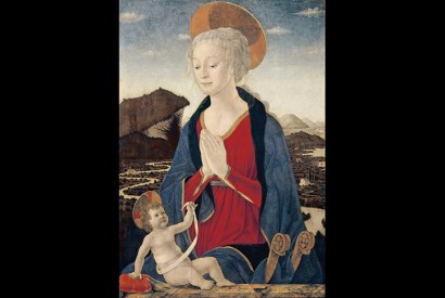 Alesso Baldovinetti’s ‘Madonna and Child’ (c. 1464) is rich in symbolism. The infant Christ holds his swaddling band up to the Virgin’s womb, as if it were a token of the umbilical cord that united them. The winding shape of the bandage is echoed in the distant meandering river. The Madonna’s gossamer veil falls over her head as a pyx-cloth might cover a sacramental vessel.The child touches another translucent veil, draped over the cushion beside him. Towering above him, his Mother joins her hands in devotion, as if to acknowledge her Son’s meaningful gestures