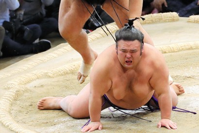 Pounds of flesh: Takayasu throws Takakeisho to the ground to win the 2018 Kyushu tournament in Fukuoka