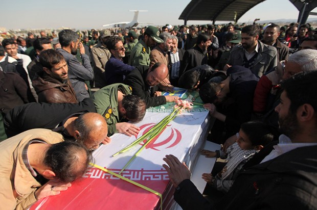 Mourners at the funeral of an Iranian Revolutionary Guard, one of 27 to be killed in a suicide bombing near the Pakistani border last week. (Hamidreza Nikoomaram/Anadolu Agency/Getty Images)