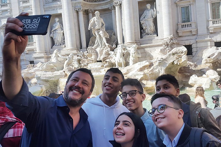 Matteo Salvini takes a selfie with five children who helped to save their classmates during the 20 March Milan bus attack