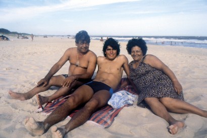 Ball boy: Maradona and his parents
