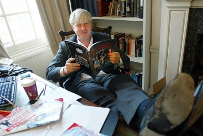 Boris Johnson in The Spectator’s editor’s chair in 2003 (Jim Watson/AFP/Getty)