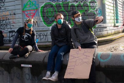 Friends take a selfie in the the Capitol Hill Autonomous Zone (CHAZ) in Seattle, Washington
