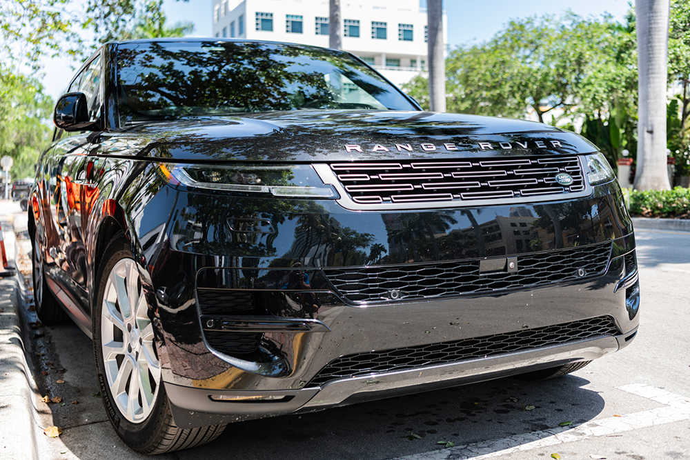 The stealth philanthropy of buying a Range Rover