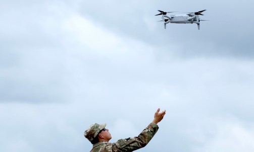 ARLINGTON, VA - JUNE 14: A soldier prepares to catch a drone in the Pentagon parking lot on June 14, 2025 in Arlington, Virginia. The U.S. Army is marking its 250th anniversary with a military parade along Constitution Avenue that includes roughly 6,600 troops, 150 vehicles, and over 50 aircraft. The parade, which coincides with President Donald Trump's 79th birthday, is designed to tell the history of the Army. (Photo by Samuel Corum/Getty Images)