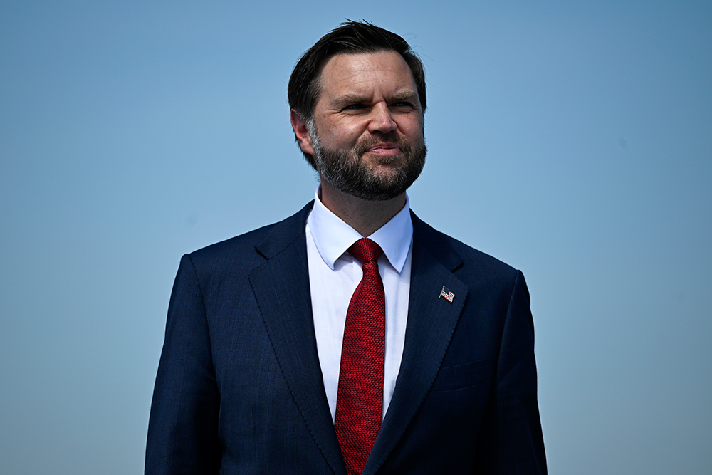 How does the Catholic J.D. Vance justify Trumpian policies?