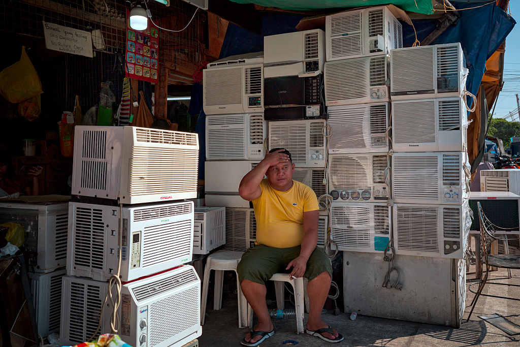 Cool it, lefties, we all need air con